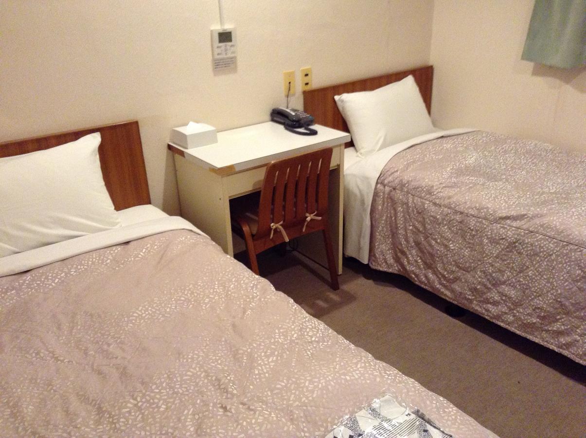 Business Hotel Kudo Нобеока Экстерьер фото