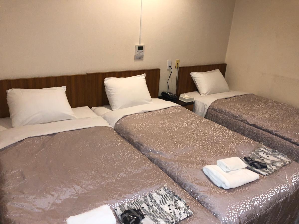 Business Hotel Kudo Нобеока Экстерьер фото